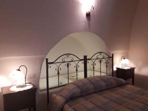 Postel nebo postele na pokoji v ubytování Masseria Cassiere