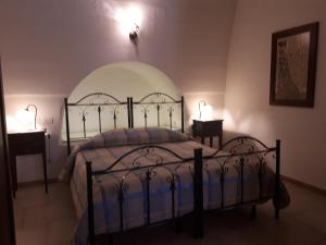Postel nebo postele na pokoji v ubytování Masseria Cassiere