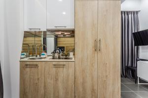 Kuchyň nebo kuchyňský kout v ubytování 8 Rooms Apartotel On Meidan + 37 fotografií