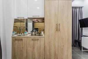 Virtuvė arba virtuvėlė apgyvendinimo įstaigoje 8 Rooms Apartotel On Meidan