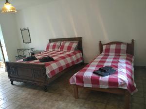 Postel nebo postele na pokoji v ubytování Le Botcol