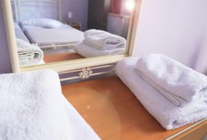 Ένα ή περισσότερα κρεβάτια σε δωμάτιο στο Merso