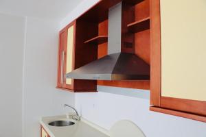 Kuchyň nebo kuchyňský kout v ubytování Apartamentos Credencial