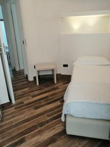Posteľ alebo postele v izbe v ubytovaní Resort Il Mulino
