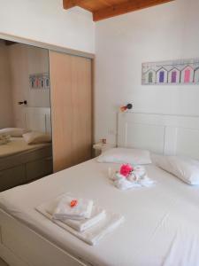 Katil atau katil-katil dalam bilik di Chez Athena/ Vacation home for 6 in Chania