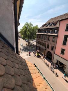 a view of a city street from a building at Beauty & The Beast - Old Town Cosy Apartments in Colmar