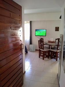 TV a/nebo společenská místnost v ubytování City Apartment