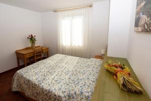 Agritur La Pieve客房内的一张或多张床位