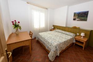 Agritur La Pieve客房内的一张或多张床位