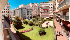 an aerial view of a park in a city at Palais Armenonville Cannes avec Parking proche Carlton Croisette in Cannes