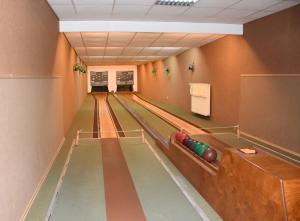 an empty bowling alley with pins on the lanes at Alt Wehlheiden in Kassel