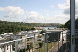 a view from the balcony of a building at Freshwater Bay Holiday Cottages in Pembroke