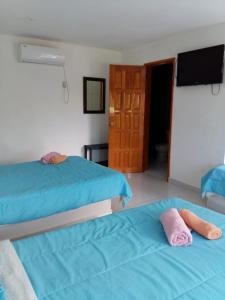 Cama o camas de una habitación en Hotel Playa Krystal