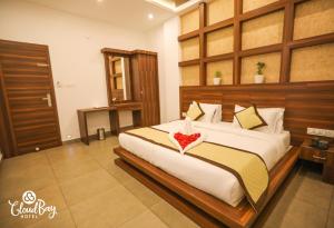 Ένα ή περισσότερα κρεβάτια σε δωμάτιο στο Hotel CloudBay