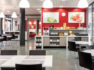 Restaurace v ubytování Aparthotel Adagio Access Paris Clichy