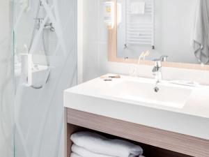 Koupelna v ubytování Aparthotel Adagio Access Paris Clichy