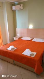 Posteľ alebo postele v izbe v ubytovaní Oniro Rooms & Suites