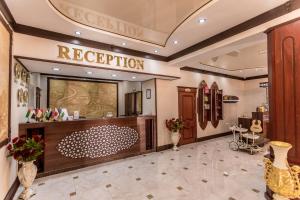 a reception area of a fashion store at Hotel Turon Plaza in Bukhara
