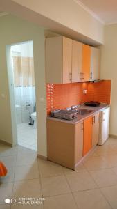 Kuchyňa alebo kuchynka v ubytovaní Oniro Rooms & Suites