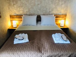 A bed or beds in a room at Paradise Kazbegi