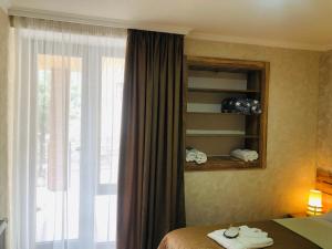 A bed or beds in a room at Paradise Kazbegi