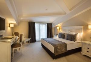 Postel nebo postele na pokoji v ubytování Ottoman's Life Hotel Deluxe