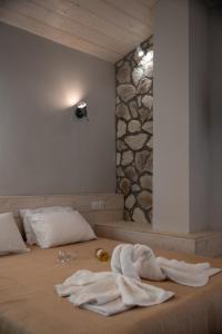 Posteľ alebo postele v izbe v ubytovaní Oniro Rooms & Suites