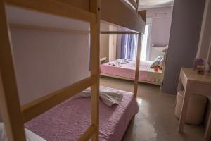 Posteľ alebo postele v izbe v ubytovaní Oniro Rooms & Suites