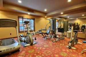 a gym with several treadmills and exercise bikes at Big Sky Resort Village Center in Big Sky