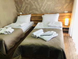 A bed or beds in a room at Paradise Kazbegi