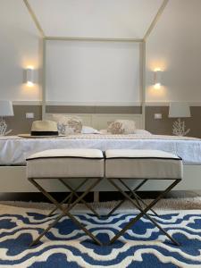 A bed or beds in a room at SOGNO