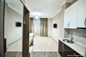 Postel nebo postele na pokoji v ubytování Hotel Wave