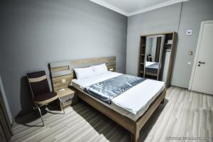 Postel nebo postele na pokoji v ubytování Hotel Wave