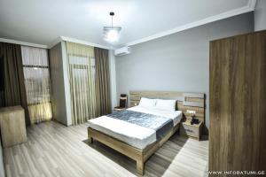 Postel nebo postele na pokoji v ubytování Hotel Wave