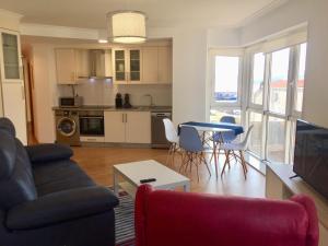 Kuchnia lub aneks kuchenny w obiekcie Portosín -Suites