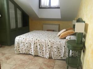 Postel nebo postele na pokoji v ubytování Posada El Nozal
