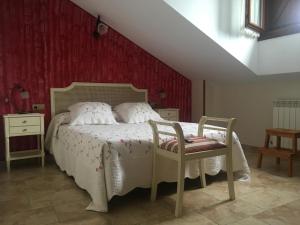 Postel nebo postele na pokoji v ubytování Posada El Nozal