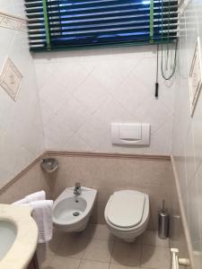 Ein Badezimmer in der Unterkunft Rooms Villa Bergamo Airport