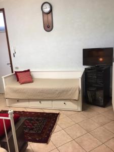 Ein Bett oder Betten in einem Zimmer der Unterkunft Rooms Villa Bergamo Airport