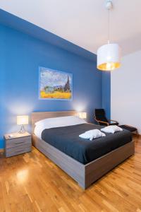 Кровать или кровати в номере Tavanti Suite