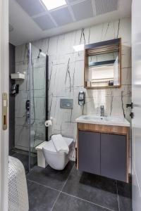 Ванная комната в Aspendos eXtra