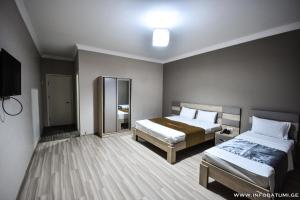 Postel nebo postele na pokoji v ubytování Hotel Wave