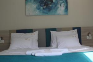 Letto o letti in una camera di Montebay Perla
