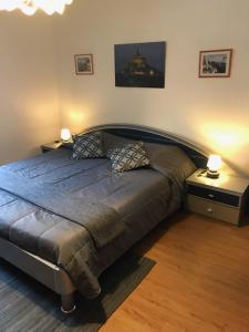 Кровать или кровати в номере Chez Michel