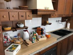 Kuchyň nebo kuchyňský kout v ubytování B&B Fiume + 35 fotografií