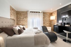Postel nebo postele na pokoji v ubytování Hotel-Spa Classic Begur