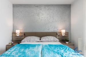 Postel nebo postele na pokoji v ubytování Apartments Vila DK