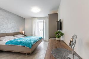 Postel nebo postele na pokoji v ubytování Apartments Vila DK