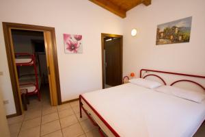 Postel nebo postele na pokoji v ubytování Camping Santin