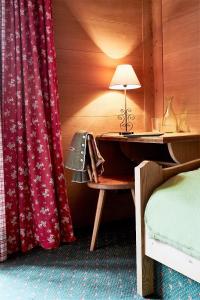 Postel nebo postele na pokoji v ubytování Gasthof-Hotel Dannerwirt